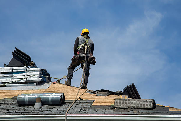 Professional Roofing technician working in Queens Village, NY